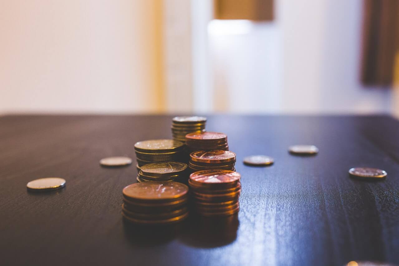 Pile of coins on table